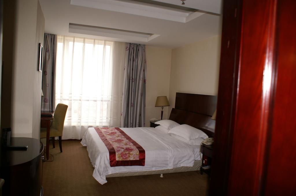 Weigela Park Hotel Далянь Номер фото